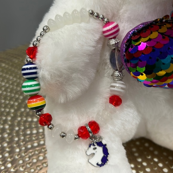 Aurora unicorn plush. Includes the unicorn bracelet. Great for a gift. 🦄 - Picture 2 of 5